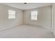Spacious bedroom with neutral walls and carpet flooring at 4902 N Capitol Ave, Indianapolis, IN 46208