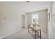 Bedroom with a desk and chair, closet, and window with blinds at 4902 N Capitol Ave, Indianapolis, IN 46208