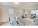 Open concept dining area with view into living room and kitchen at 4902 N Capitol Ave, Indianapolis, IN 46208