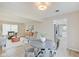 Modern dining area with open concept to kitchen and living room at 4902 N Capitol Ave, Indianapolis, IN 46208