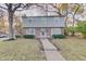 Two-story house with brick and siding, landscaping, and walkway at 4902 N Capitol Ave, Indianapolis, IN 46208