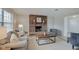 Living room with brick fireplace and a stylish mantel at 4902 N Capitol Ave, Indianapolis, IN 46208