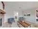 Open concept living room with view into kitchen and stairway at 4902 N Capitol Ave, Indianapolis, IN 46208