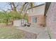 Cozy patio with seating area, fire pit, and storage shed at 4902 N Capitol Ave, Indianapolis, IN 46208