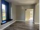 Living area featuring a built-in window seat and hardwood floors at 503 E Clyde St, Frankton, IN 46044