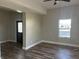 Living room with hardwood floors and lots of natural light at 503 E Clyde St, Frankton, IN 46044
