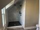 Large walk-in shower with marble tile and black accents at 503 E Clyde St, Frankton, IN 46044