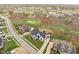 Luxury home with a spacious driveway and golf course views at 10771 Holliday Farms Blvd, Zionsville, IN 46077