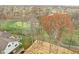 House with backyard patio and golf course view at 10771 Holliday Farms Blvd, Zionsville, IN 46077