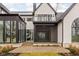 Modern home with a screened-in porch and glass sunroom at 10771 Holliday Farms Blvd, Zionsville, IN 46077