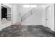Finished basement with a built-in bench and concrete floors at 10771 Holliday Farms Blvd, Zionsville, IN 46077
