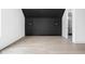 Bedroom with hardwood floors and a dark accent wall at 10771 Holliday Farms Blvd, Zionsville, IN 46077