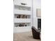Stylish built-in shelving unit showcasing decorative pottery at 10771 Holliday Farms Blvd, Zionsville, IN 46077