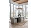 Elegant dining room with large windows, wood accents, and neutral tones at 10771 Holliday Farms Blvd, Zionsville, IN 46077