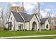 Stunning white and black exterior of a two-story home at 10771 Holliday Farms Blvd, Zionsville, IN 46077
