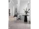 Elegant hallway with terrazzo flooring and black accents at 10771 Holliday Farms Blvd, Zionsville, IN 46077
