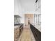 Modern kitchen with marble countertops and island at 10771 Holliday Farms Blvd, Zionsville, IN 46077