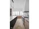 Modern kitchen with marble countertops and island at 10771 Holliday Farms Blvd, Zionsville, IN 46077