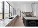Modern kitchen with marble countertops and island at 10771 Holliday Farms Blvd, Zionsville, IN 46077