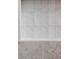 Modern shower with white tile and gold fixtures at 10771 Holliday Farms Blvd, Zionsville, IN 46077