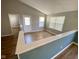 Bright living room with hardwood floors and a half wall at 1229 Spencer Dr, Greenwood, IN 46143