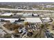Aerial view of home and neighborhood, showing nearby businesses and highway at 1514 E 12Th St, Indianapolis, IN 46201
