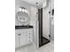 Stylish bathroom featuring a black and white tile shower and a sleek vanity at 1514 E 12Th St, Indianapolis, IN 46201