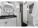 Modern bathroom with white subway tile shower and floating vanity at 1514 E 12Th St, Indianapolis, IN 46201