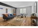 Spacious living room with hardwood floors, comfortable seating, and natural light at 1514 E 12Th St, Indianapolis, IN 46201