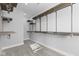 Large walk-in closet with custom shelving and hanging rods at 1514 E 12Th St, Indianapolis, IN 46201