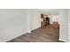 Bright dining room with hardwood floors and kitchen views at 161 Maxim Ct, Cumberland, IN 46229
