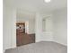 Living room with grey carpet and open concept to kitchen at 161 Maxim Ct, Cumberland, IN 46229