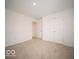 Spacious bedroom with double doors leading to additional rooms at 259 Lar Lan Dr, Danville, IN 46122