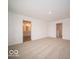 Carpeted bedroom with access to a full bathroom and hallway at 259 Lar Lan Dr, Danville, IN 46122