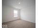 Bright bedroom with carpeted floor and large window at 259 Lar Lan Dr, Danville, IN 46122