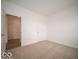Simple bedroom with neutral carpeting and hallway view at 259 Lar Lan Dr, Danville, IN 46122