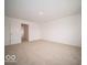 Spacious bedroom with carpet, access to hallway and another room at 259 Lar Lan Dr, Danville, IN 46122