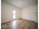 Bright dining area with hardwood floors and door access at 259 Lar Lan Dr, Danville, IN 46122