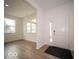 Bright and airy entryway with hardwood floors and ample natural light at 259 Lar Lan Dr, Danville, IN 46122