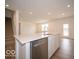 Modern kitchen with island and stainless steel dishwasher at 259 Lar Lan Dr, Danville, IN 46122