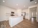Modern kitchen featuring white cabinets and an island at 259 Lar Lan Dr, Danville, IN 46122
