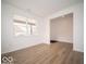 Spacious living room with hardwood floors and large windows at 259 Lar Lan Dr, Danville, IN 46122