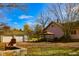 Spacious backyard with detached garage, gazebo, and fire pit at 3136 E Edgewood Ave, Indianapolis, IN 46227