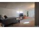 Finished basement with a bed and TV at 3136 E Edgewood Ave, Indianapolis, IN 46227