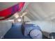 Finished attic bedroom with a large tapestry at 3136 E Edgewood Ave, Indianapolis, IN 46227
