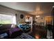 Open concept living room with hardwood floors and dining area view at 3136 E Edgewood Ave, Indianapolis, IN 46227