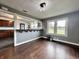 Bright dining area with hardwood floors and kitchen access at 5719 Hickory Rd, Indianapolis, IN 46239