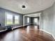 Spacious dining room featuring hardwood floors and large windows at 5719 Hickory Rd, Indianapolis, IN 46239