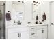 Modern bathroom with double vanity, white cabinets, and black matte fixtures at 1014 Sterling St, Indianapolis, IN 46201
