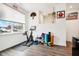 Home gym with stationary bike and various workout equipment at 1014 Sterling St, Indianapolis, IN 46201